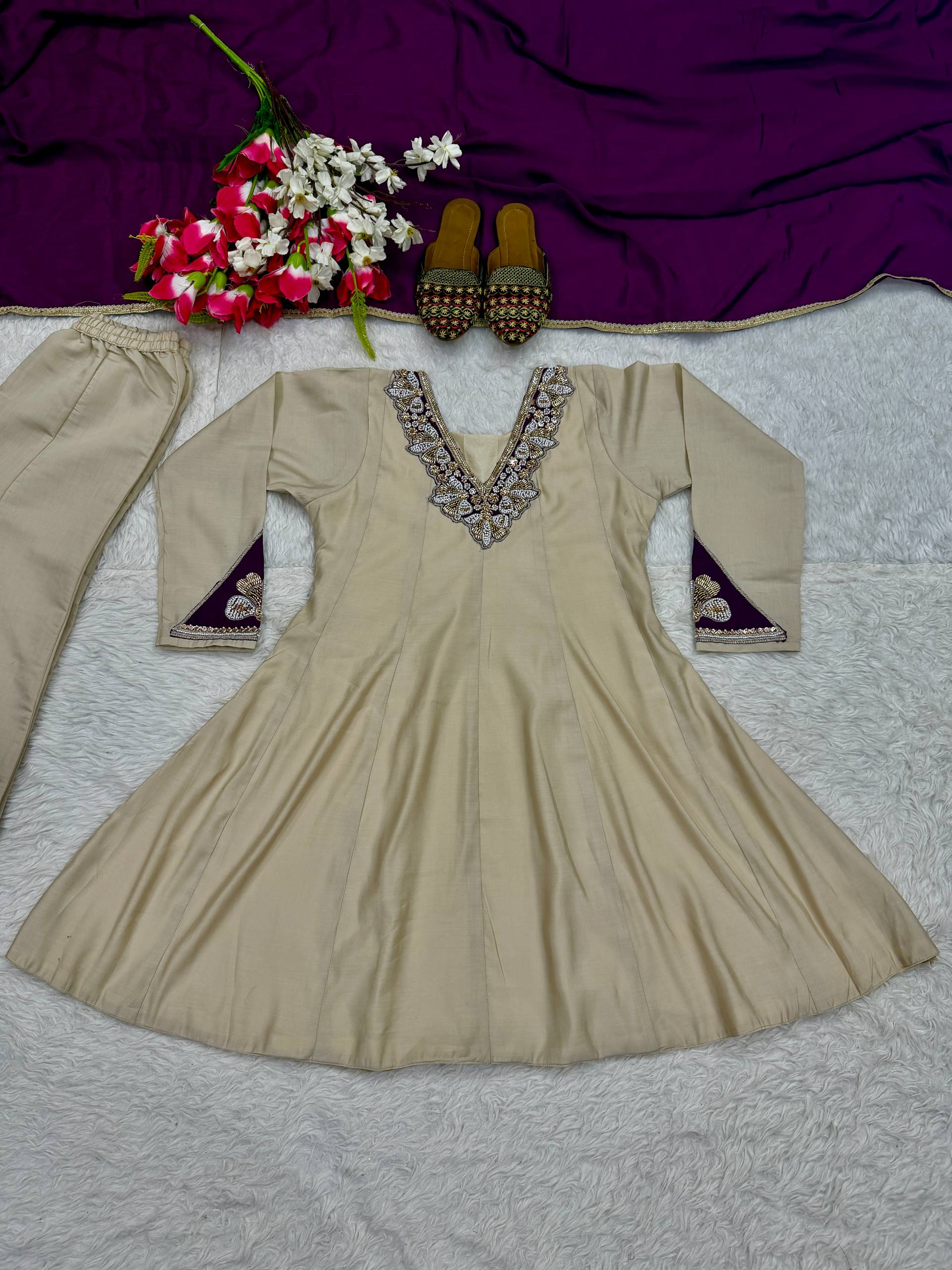 Regal Cream Silk Peplum Kurti and Flared Palazzo Suit Set Adorned with Ornate V-Neck Embroidery and a Rich Plum Purple Dupatta